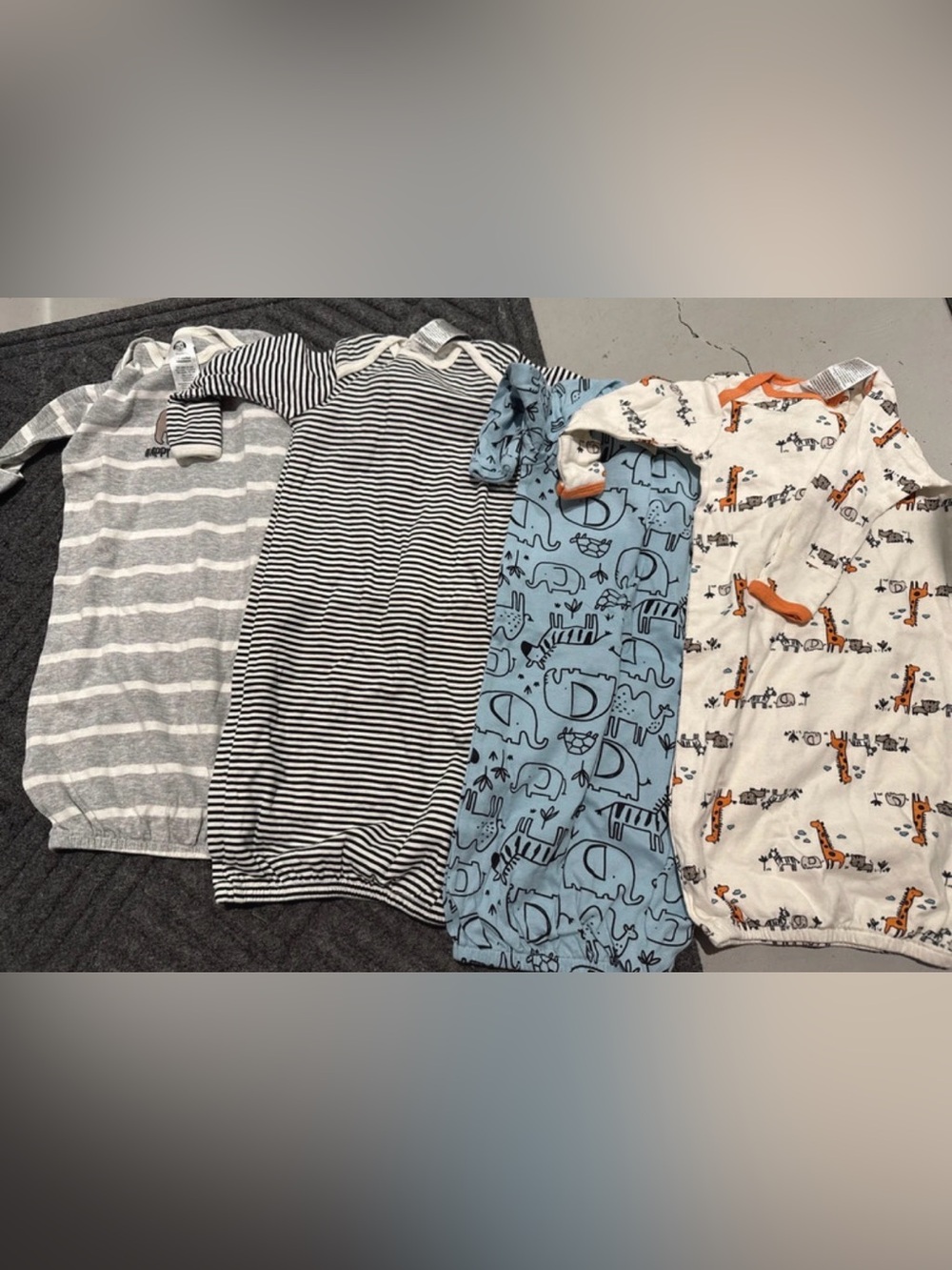4 baby gowns never been worn